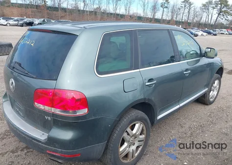 2004 Volkswagen Touareg V8 z USA, uszkodzony, nr VIN WVGCM77L44D077880